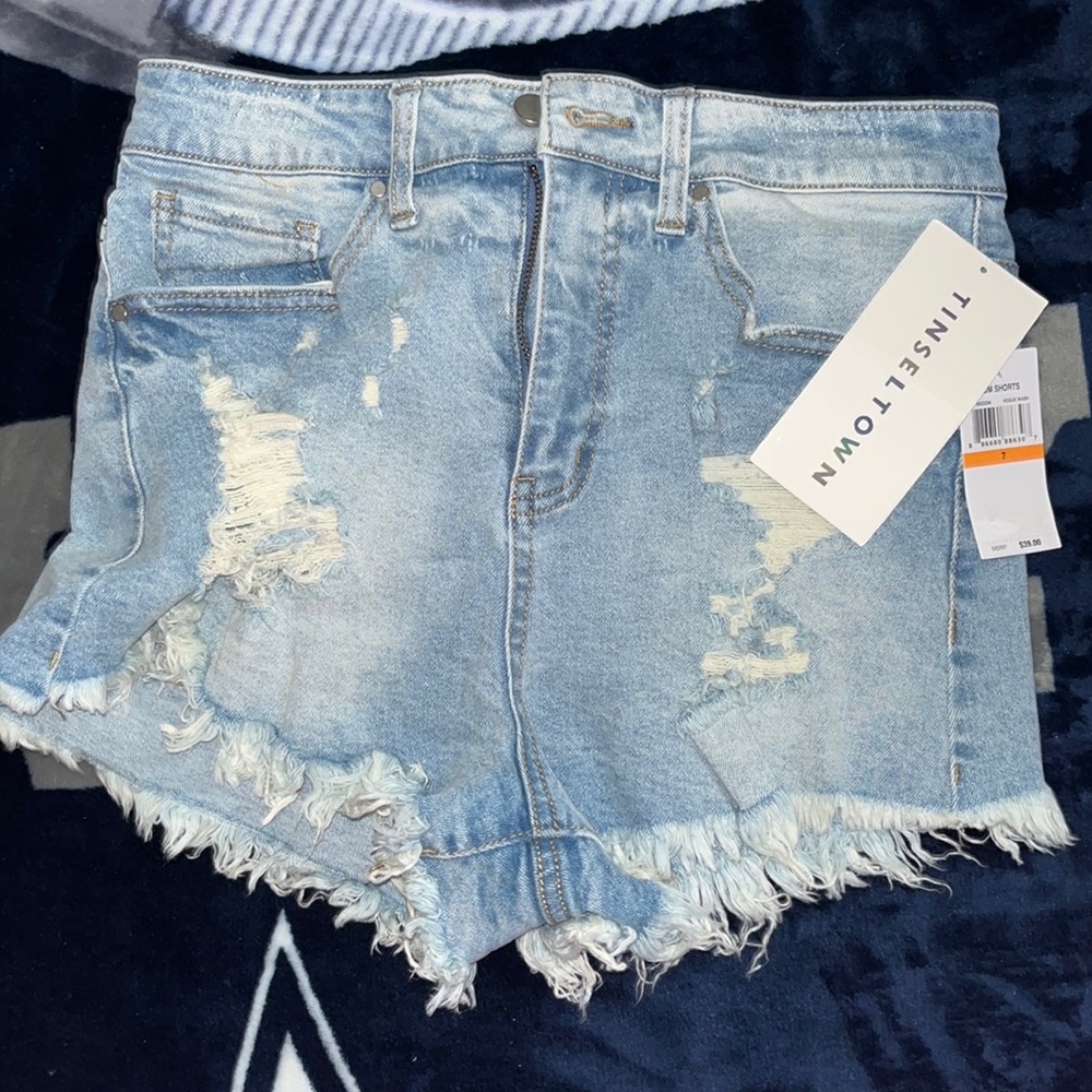 Shredded high rise blue jeans size 7